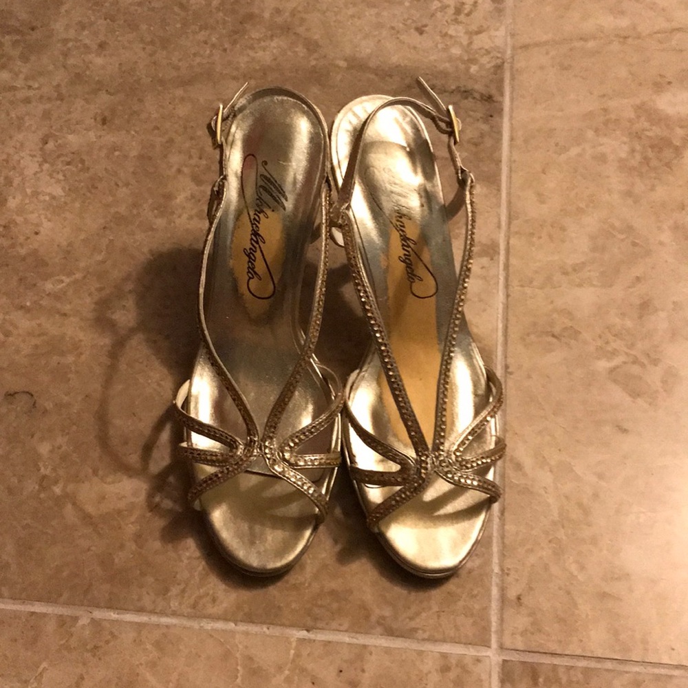 Women heels in gold sequence size 6